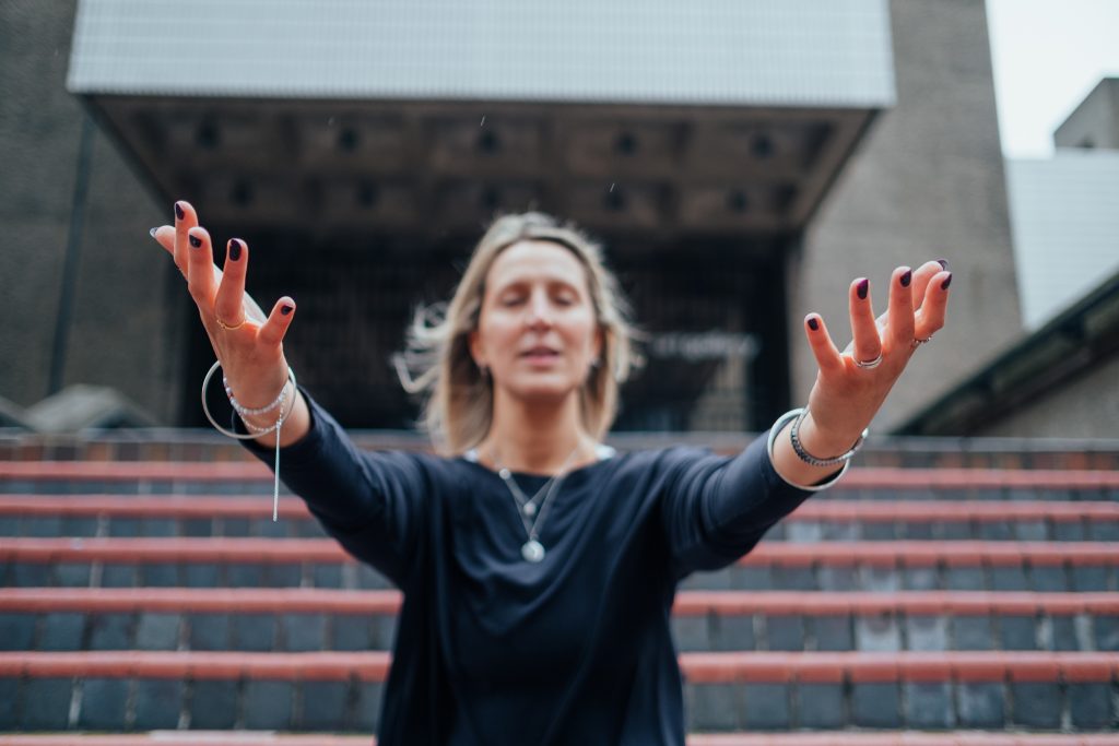 Martha wide arm on steps yoga pose photography at The Barbican