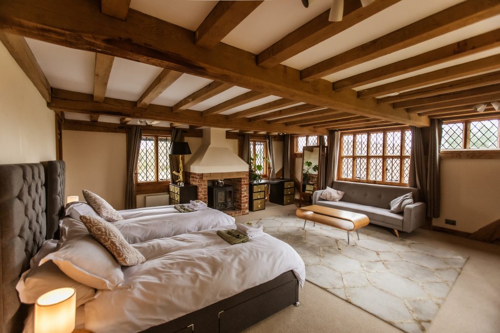 Whitfield House master suite bedroom set up with twin beds. 