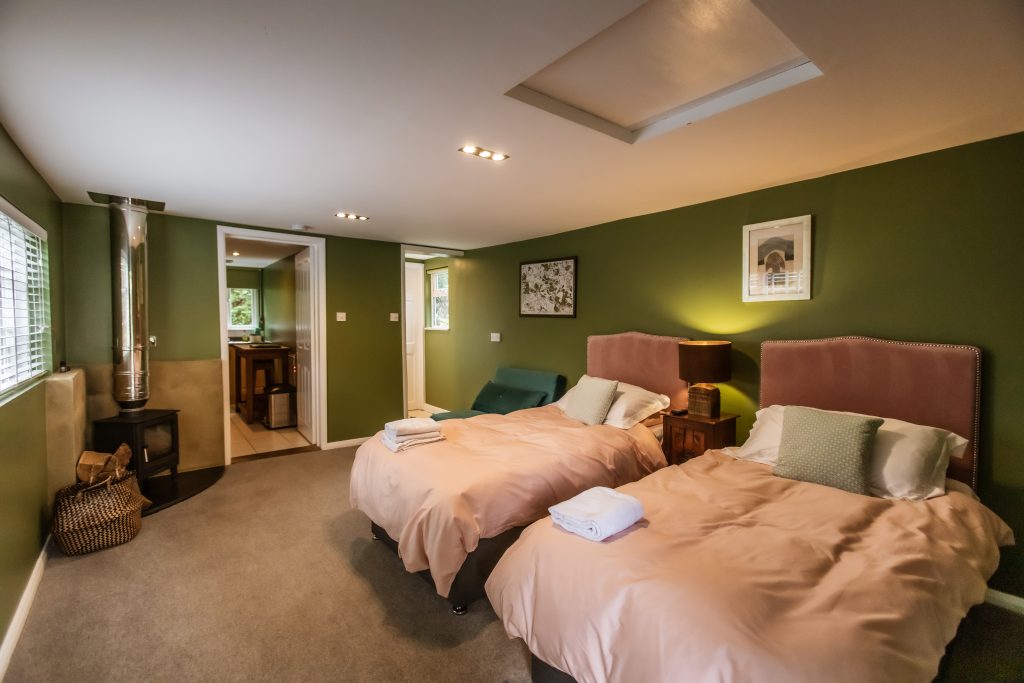 Whitfield House palmers lodge set up with twin beds.