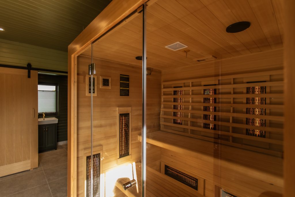 Whitfield House infrared sauna and changing room in the background