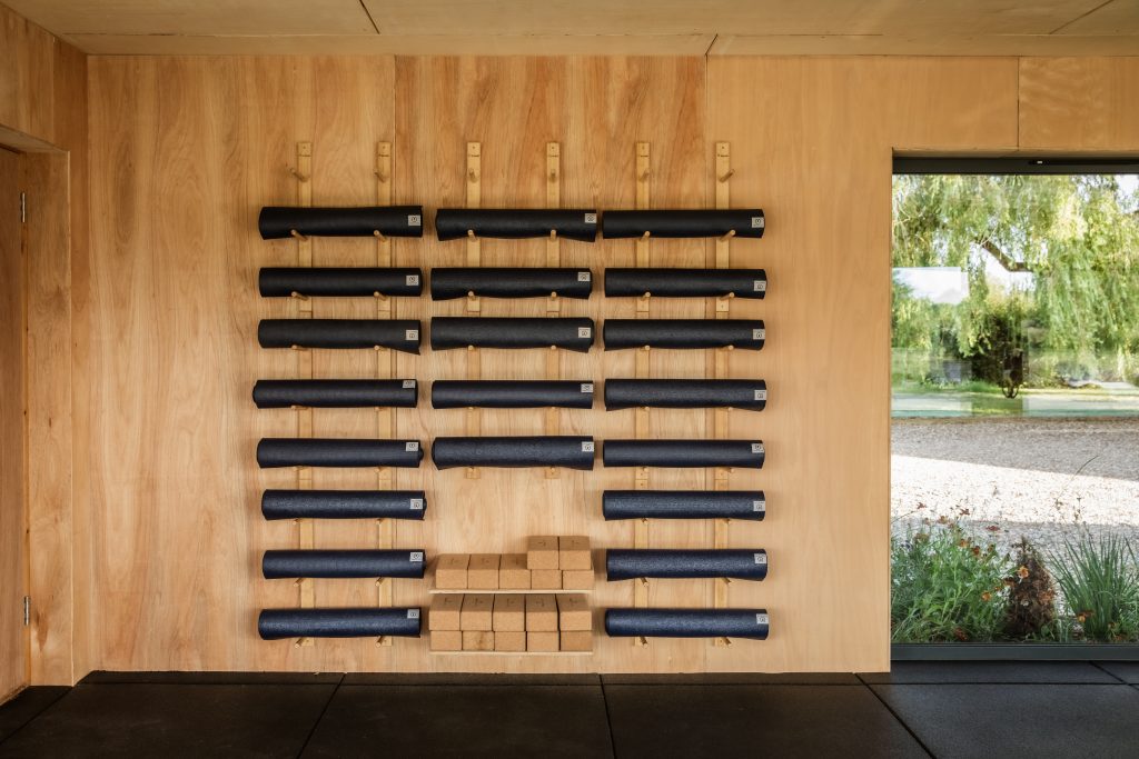 Whitfield House yoga room mat and brick storage unit.